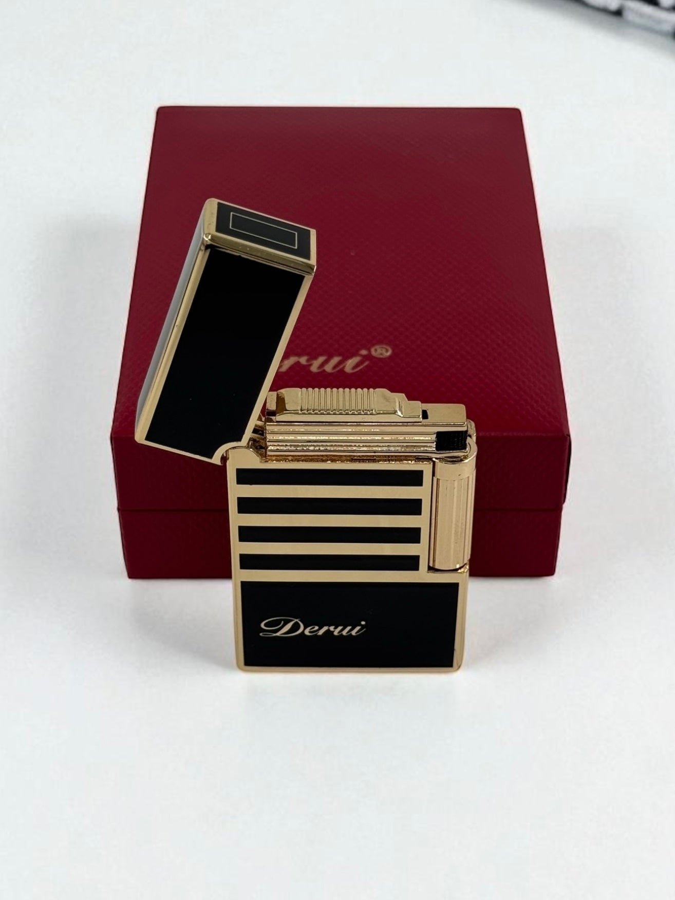 Derui Lux Siyah Altın Çizgili Gazlı Çakmak 1312